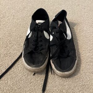 Nike Black Canvas Sneakers with White Accents